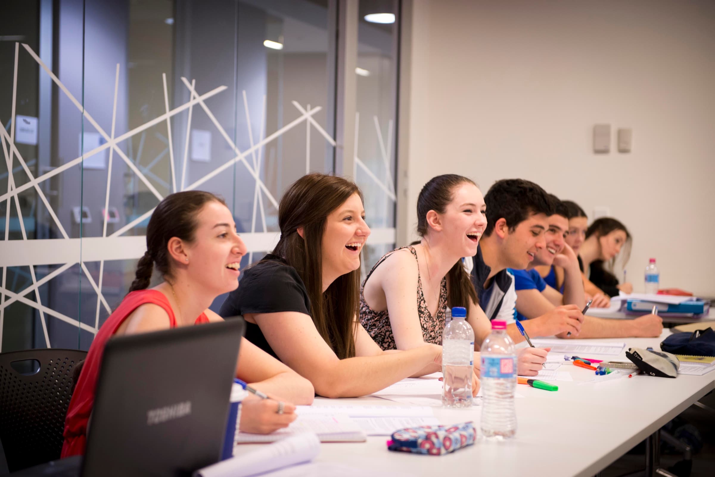 Students sharing a light moment in an InspirationED workshop
